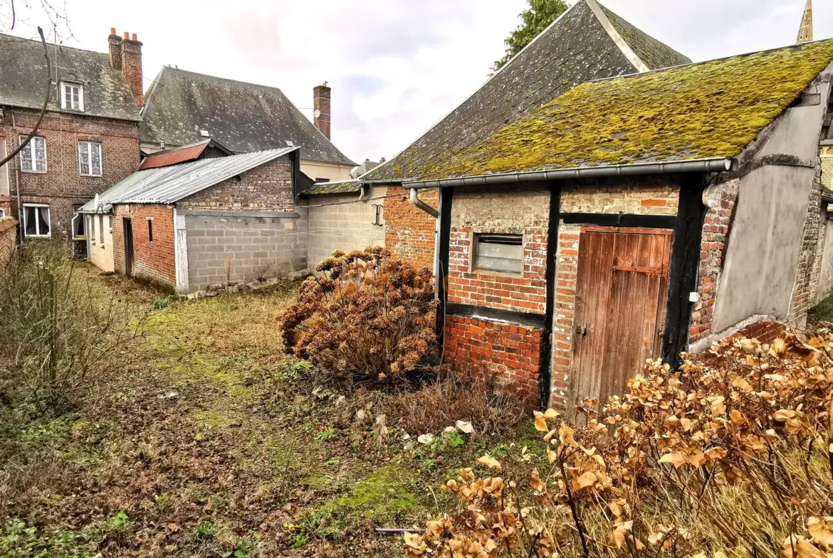 Maison de ville avec jardin à rénover à Auffay 