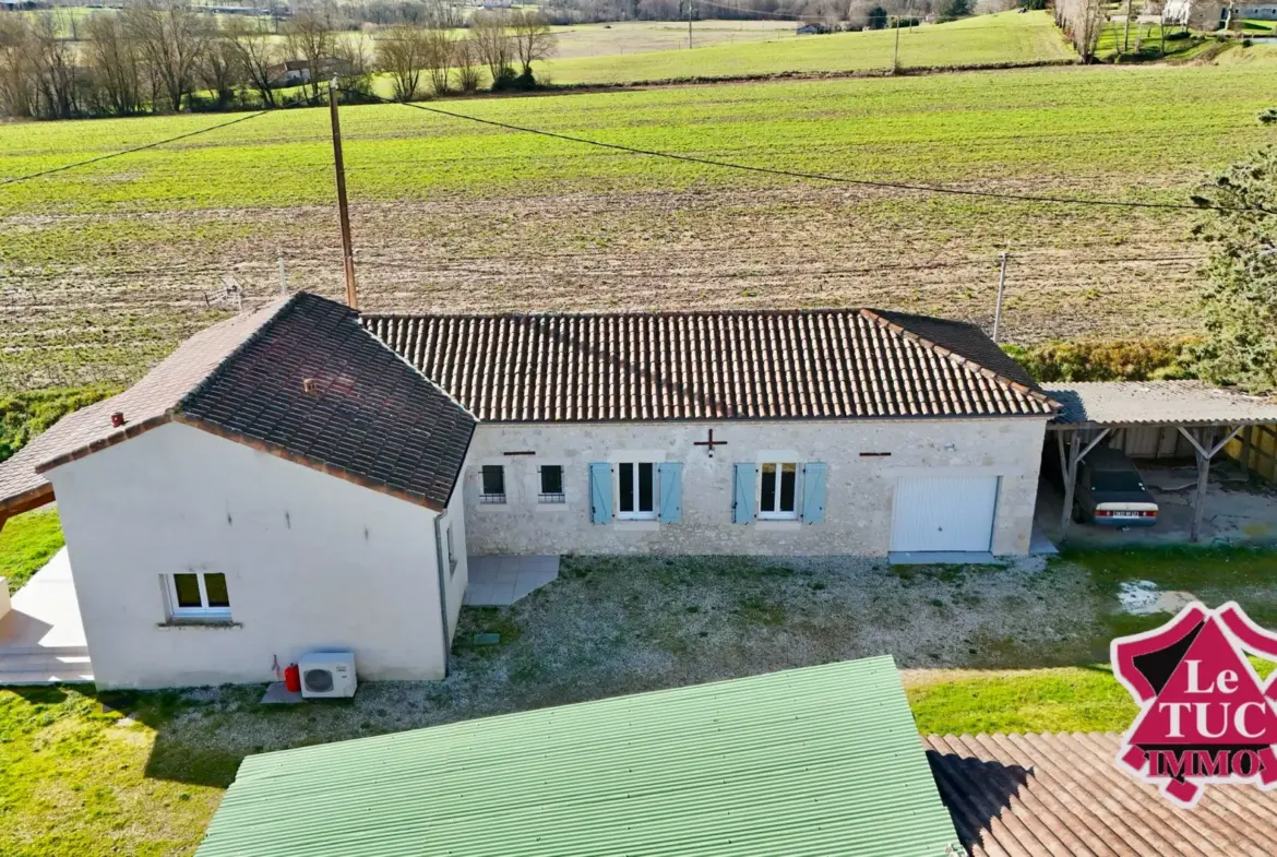 Maison en pierre avec extension moderne et terrain à Dausse 