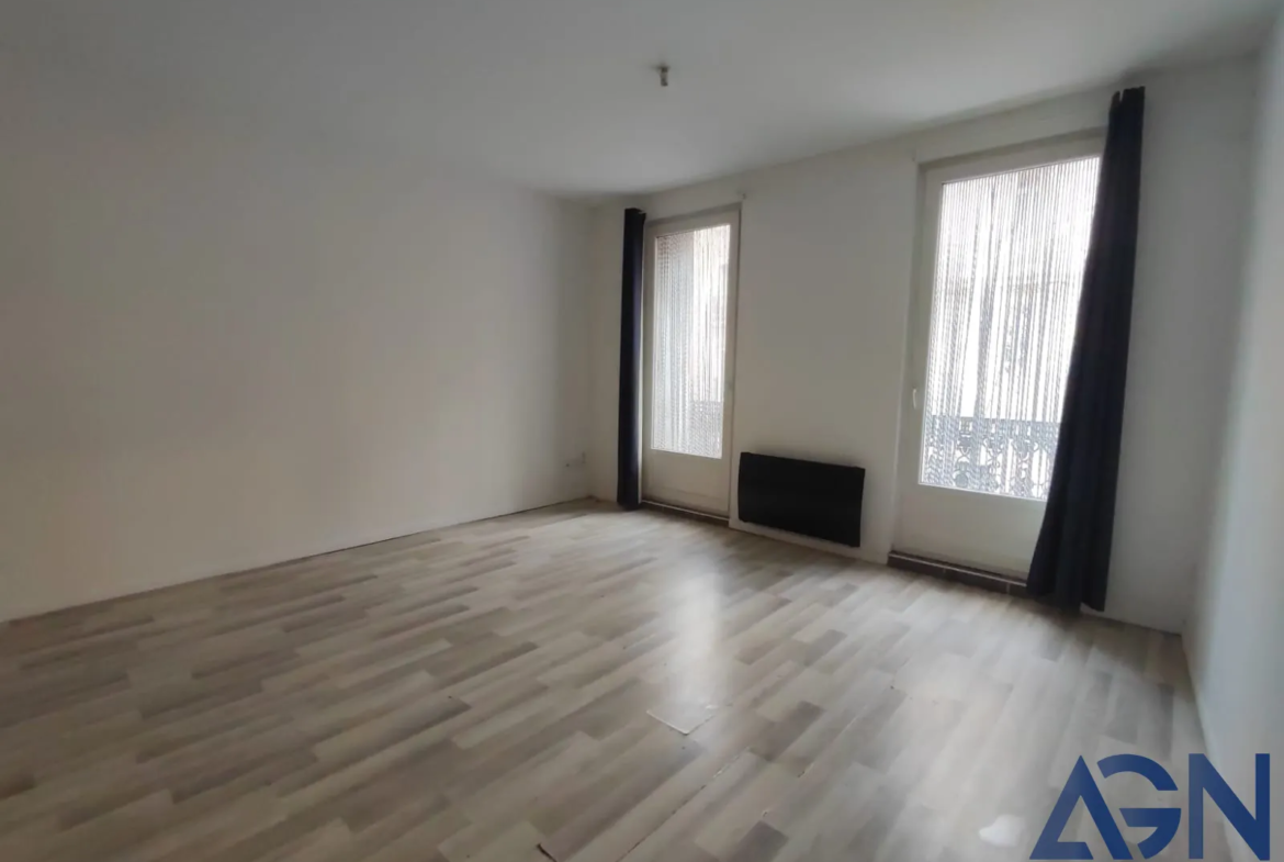 À vendre : Appartement 2 pièces de 55,74 m² avec cour à Béziers 