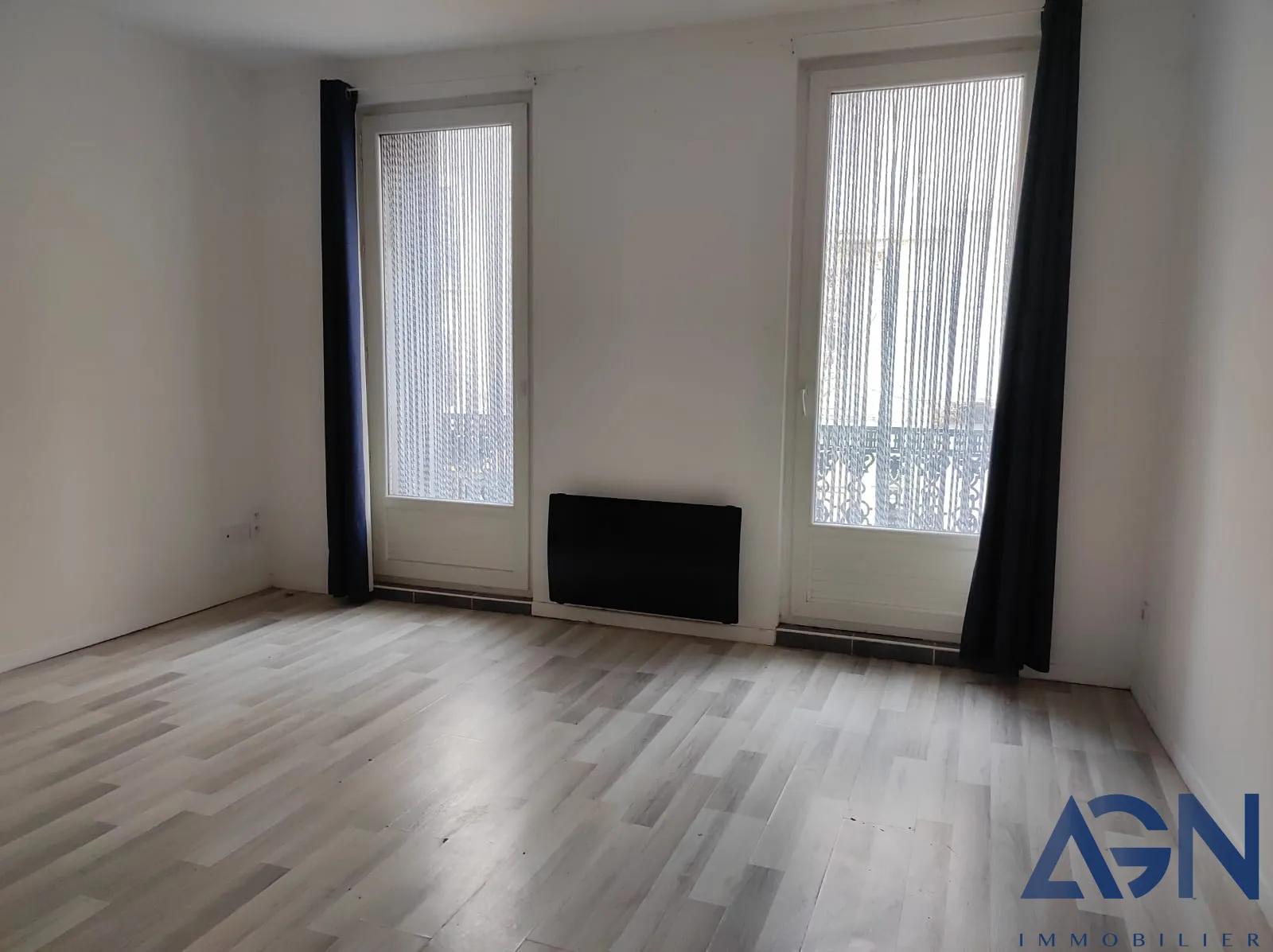 À vendre : Appartement 2 pièces de 55,74 m² avec cour à Béziers 