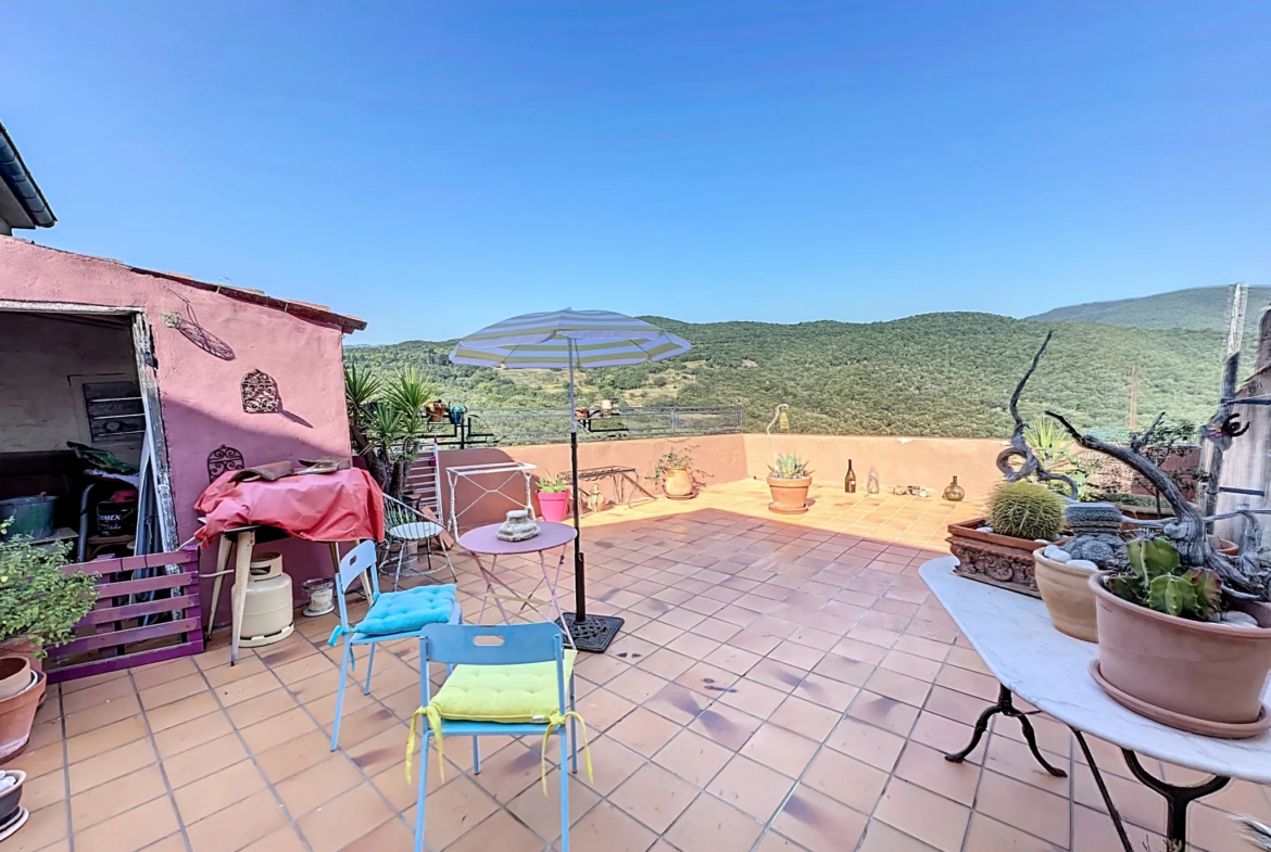 Achetez une Maison de Village avec Terrasse et Garage à Oms 