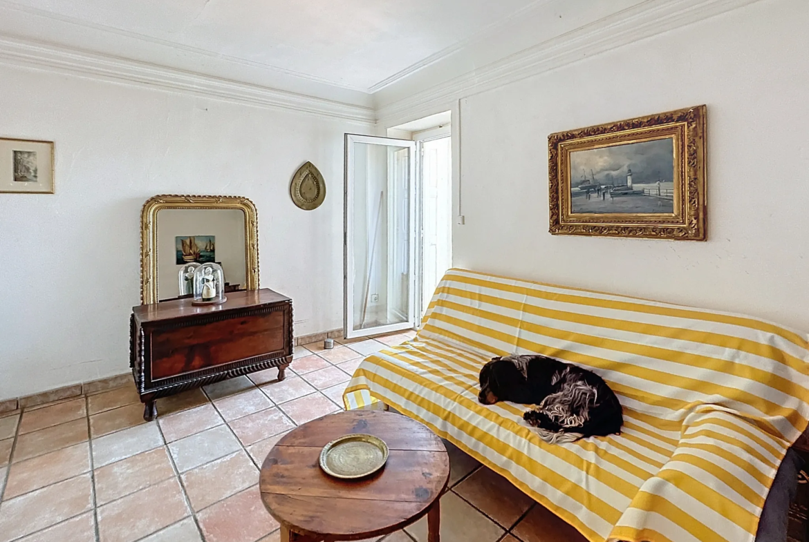 Achetez une Maison de Village avec Terrasse et Garage à Oms 