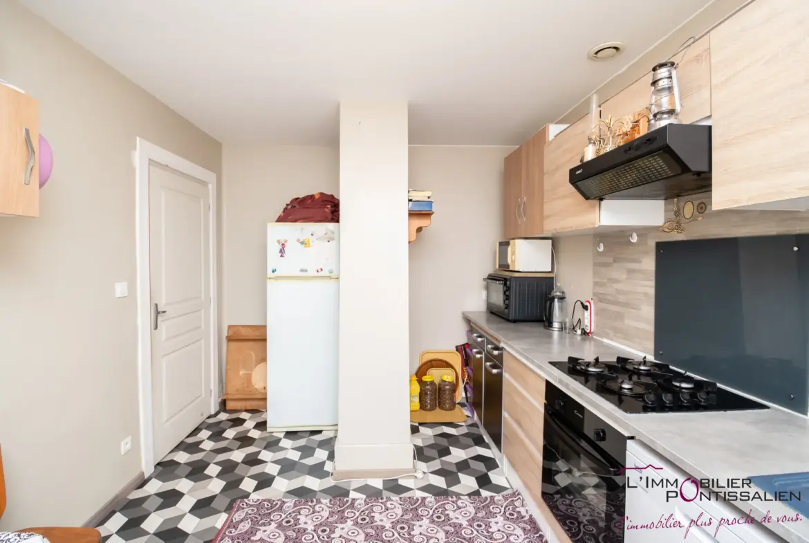 Vente de 2 appartements à Pontarlier avec jardin et garages 