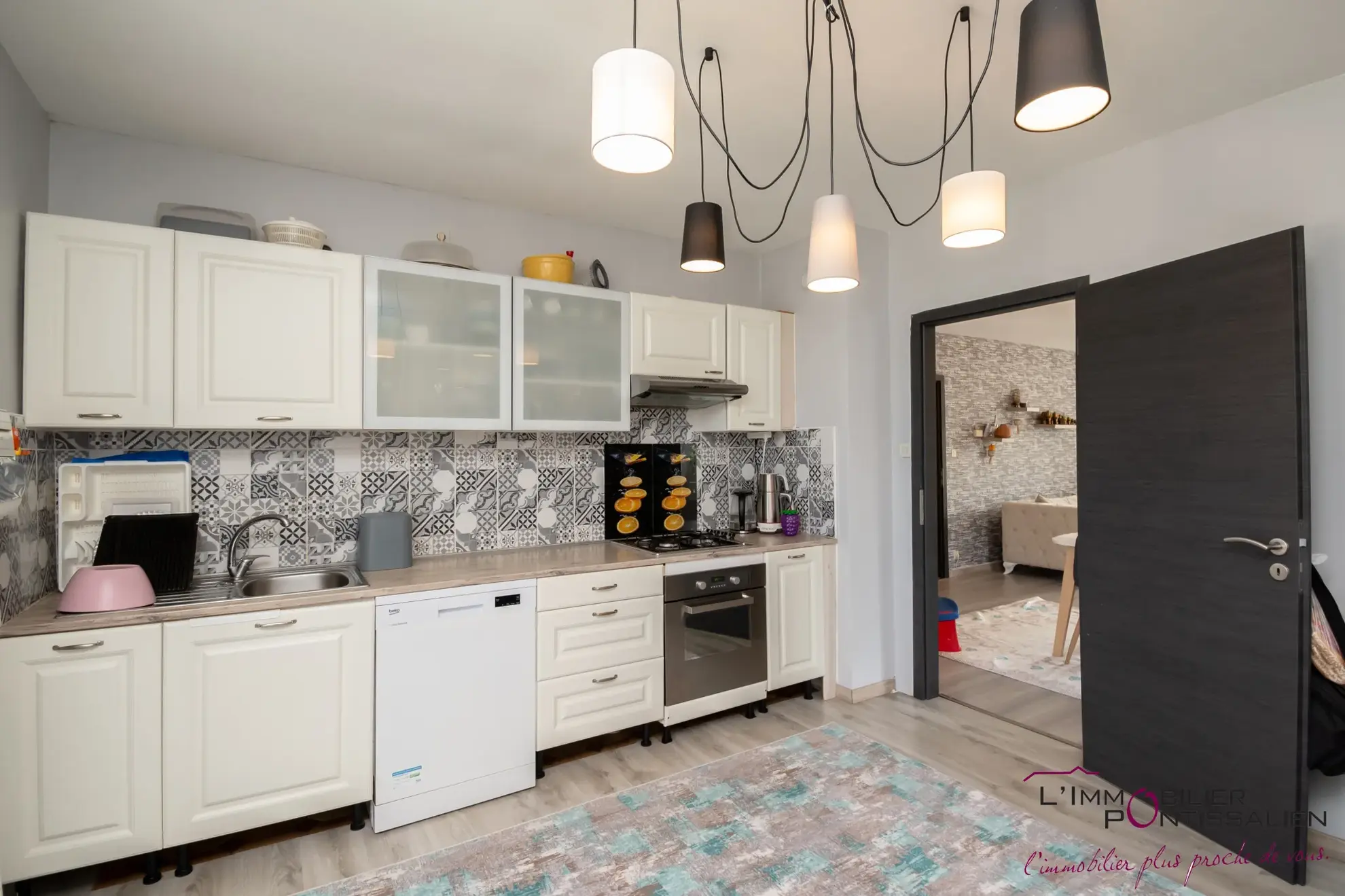 Vente de 2 appartements à Pontarlier avec jardin et garages 