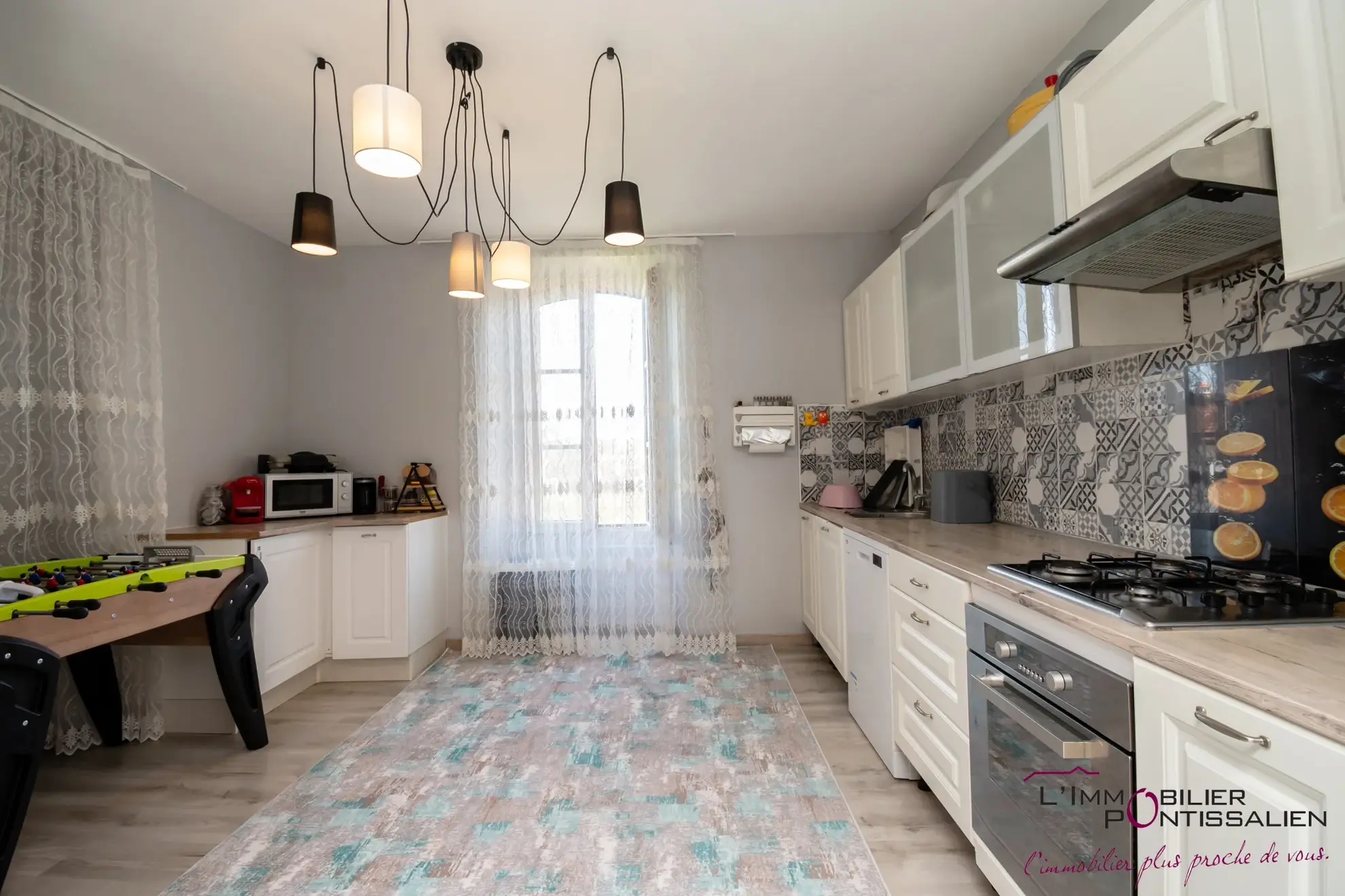 Vente de 2 appartements à Pontarlier avec jardin et garages 