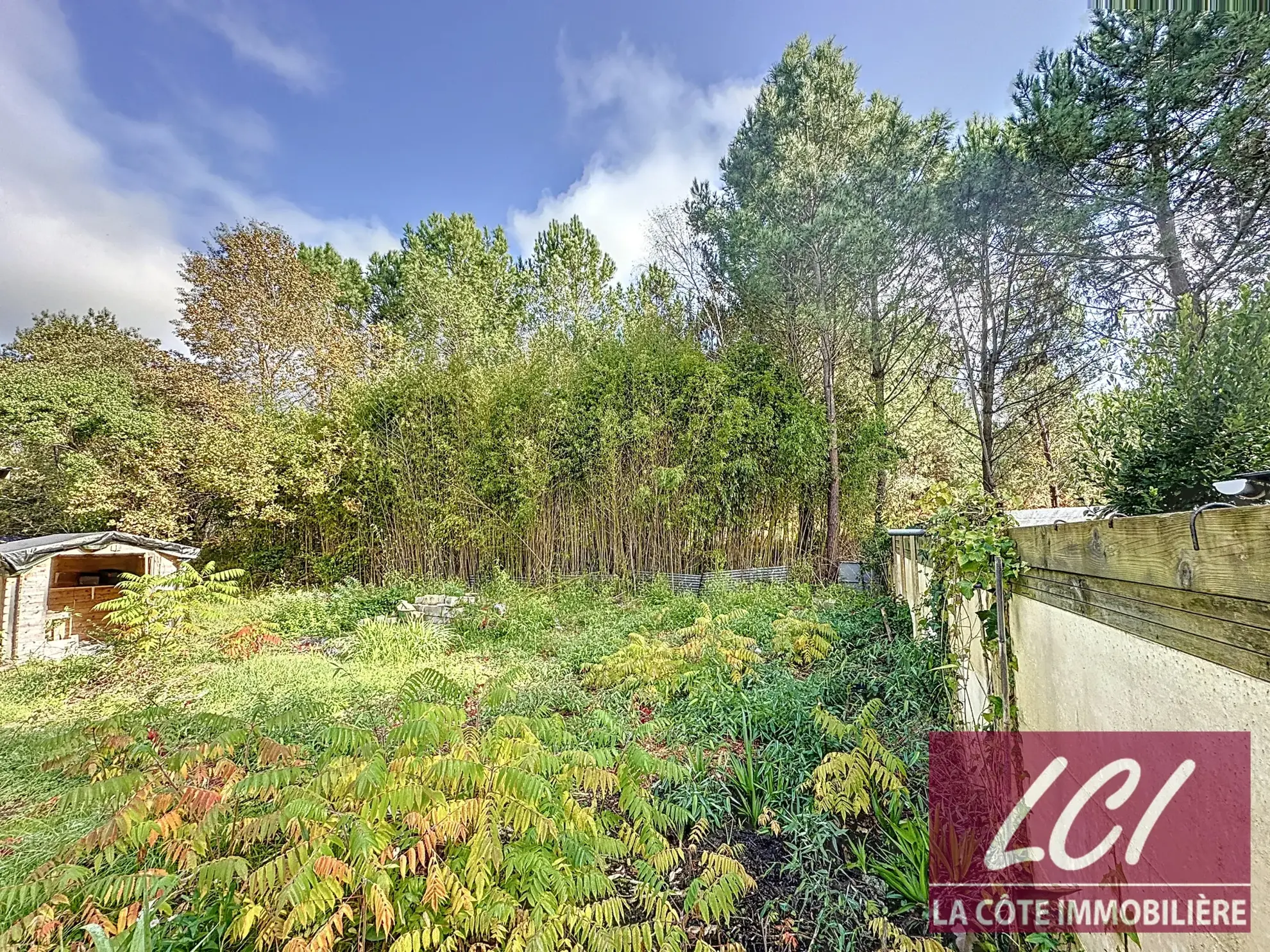 Maison en bois à Sanguinet sur terrain de 800 m² à rénover 