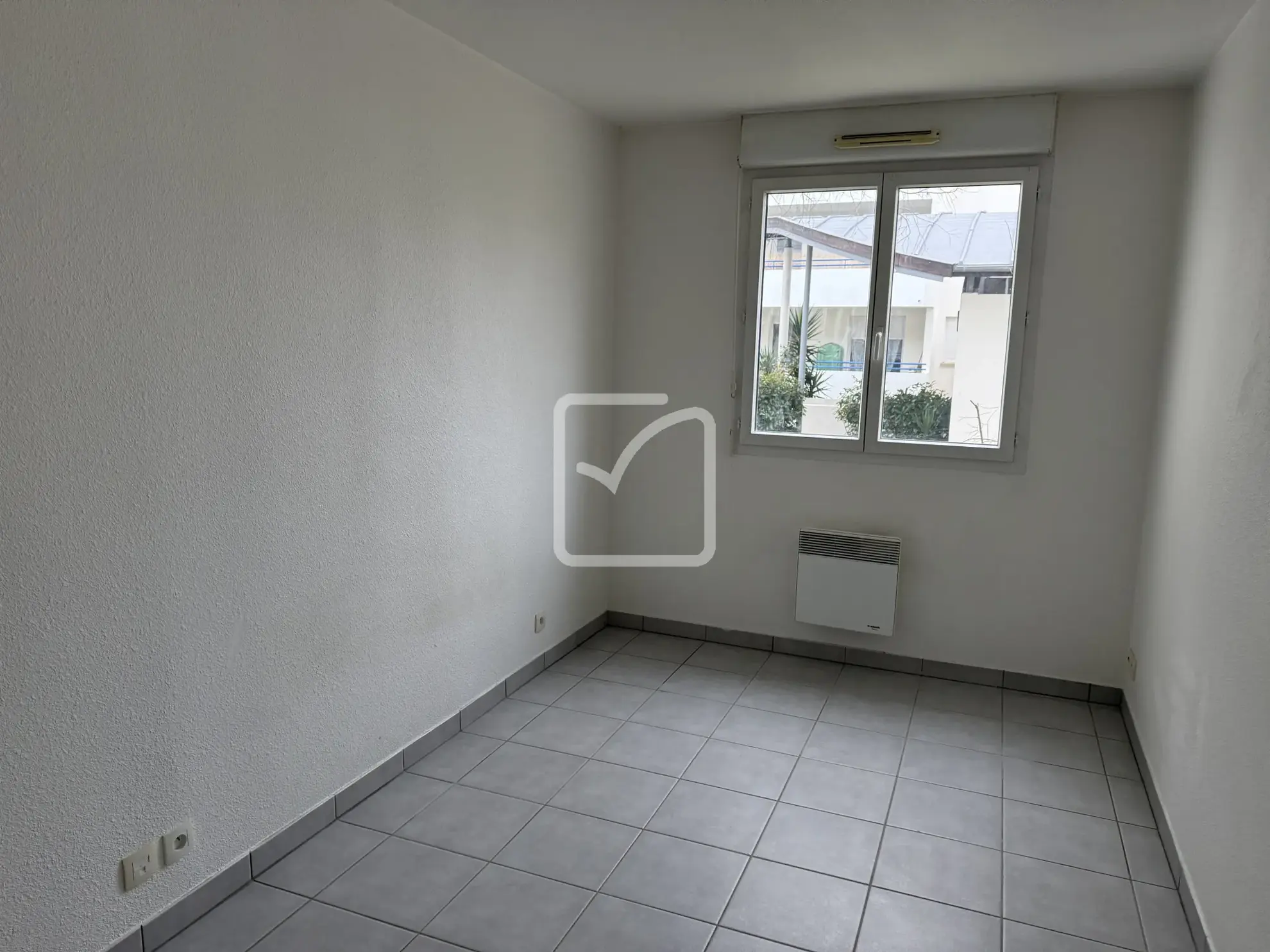 Appartement T3 à vendre à Poitiers - Résidence sécurisée avec balcon et parking 