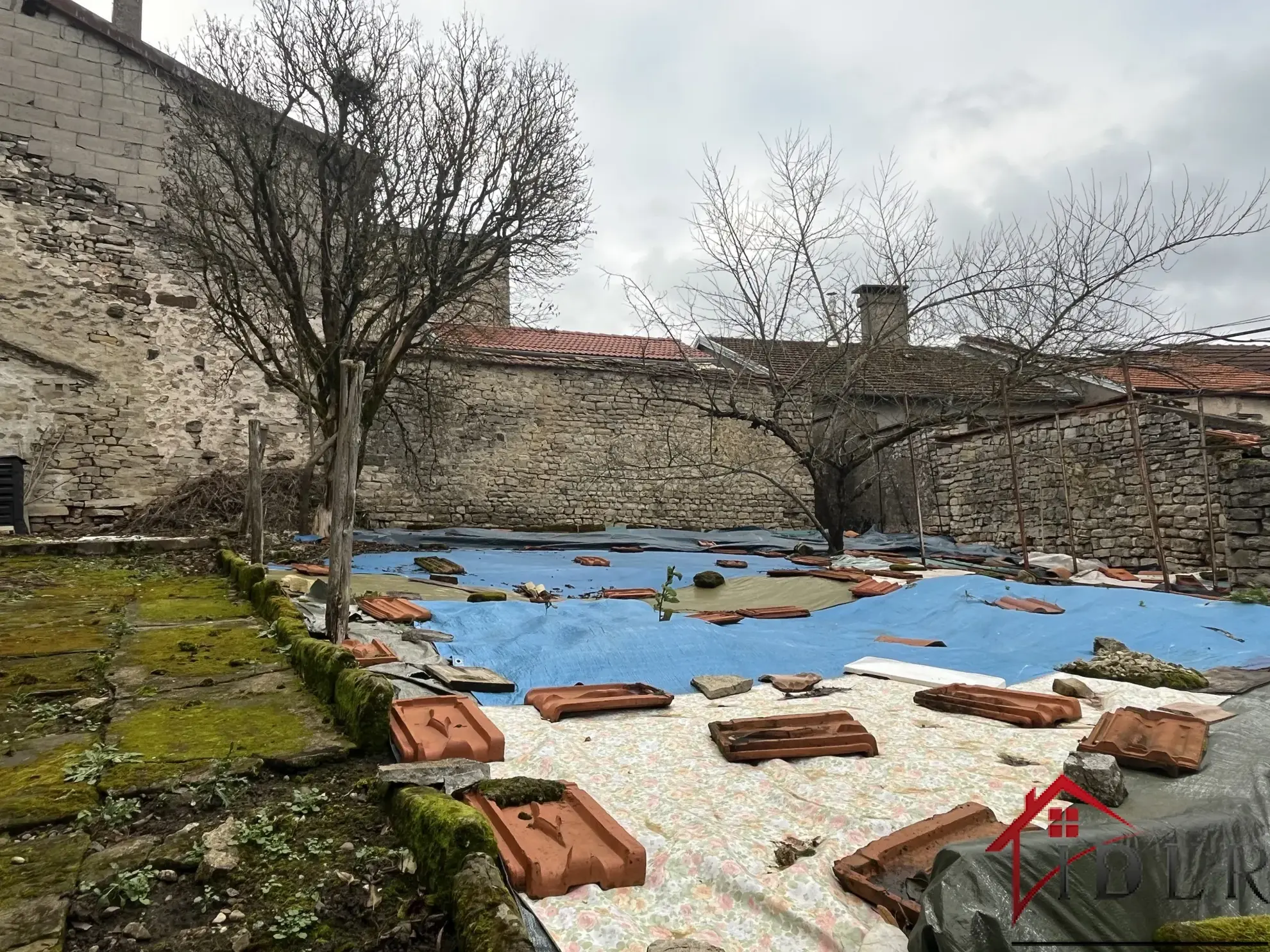 Maison à rénover avec terrain à Bourbonne les Bains 