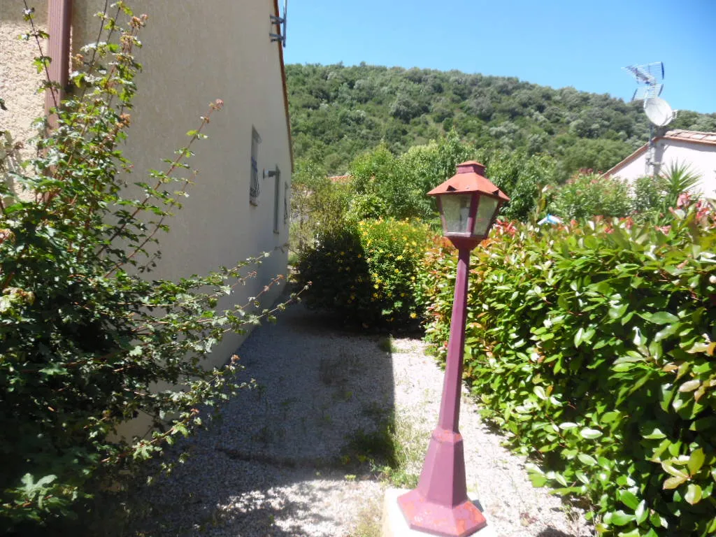 Maison 4 faces avec 2 chambres et jardin à Amélie-les-Bains-Palalda 