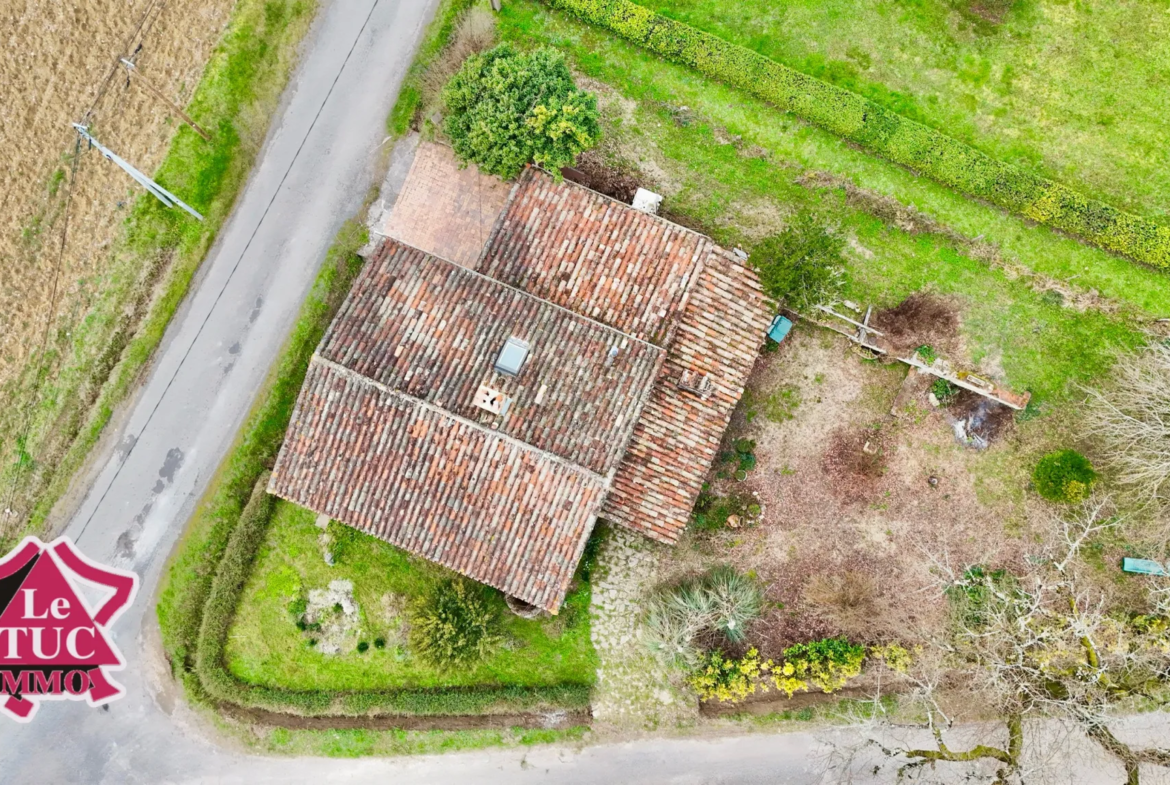 Maison en pierre à Cours avec garage et terrain arboré de 580 m² 