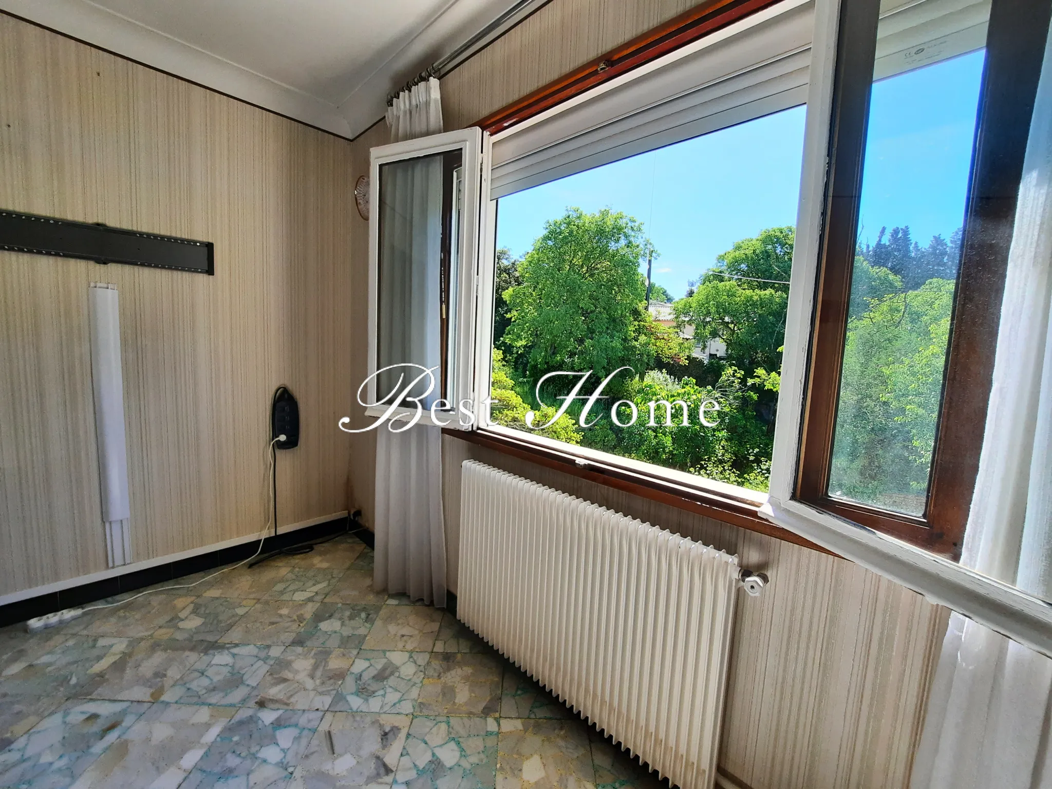 Vente d'un appartement avec terrasse et jardin à Nîmes 