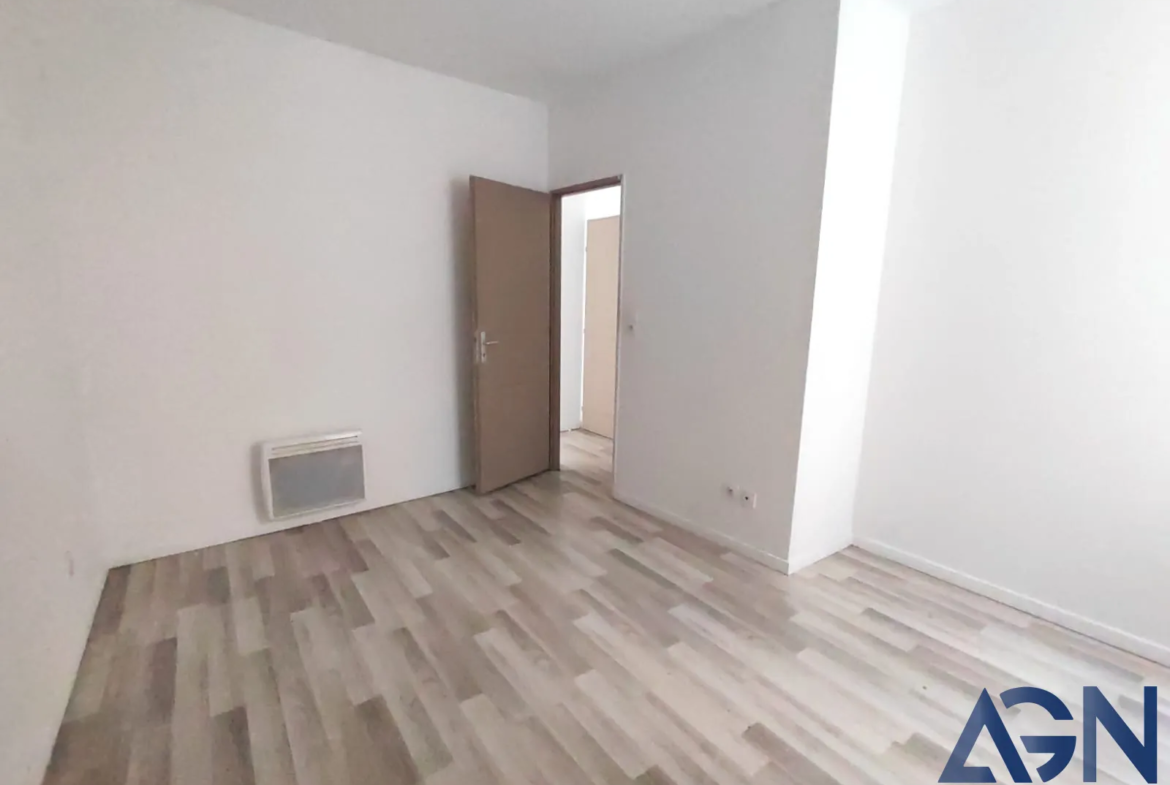 À vendre : Appartement 2 pièces de 55,74 m² avec cour à Béziers 