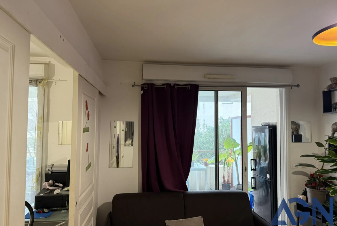 À vendre : appartement 2 pièces de 30,30 m² avec terrasse et garage à Montpellier 