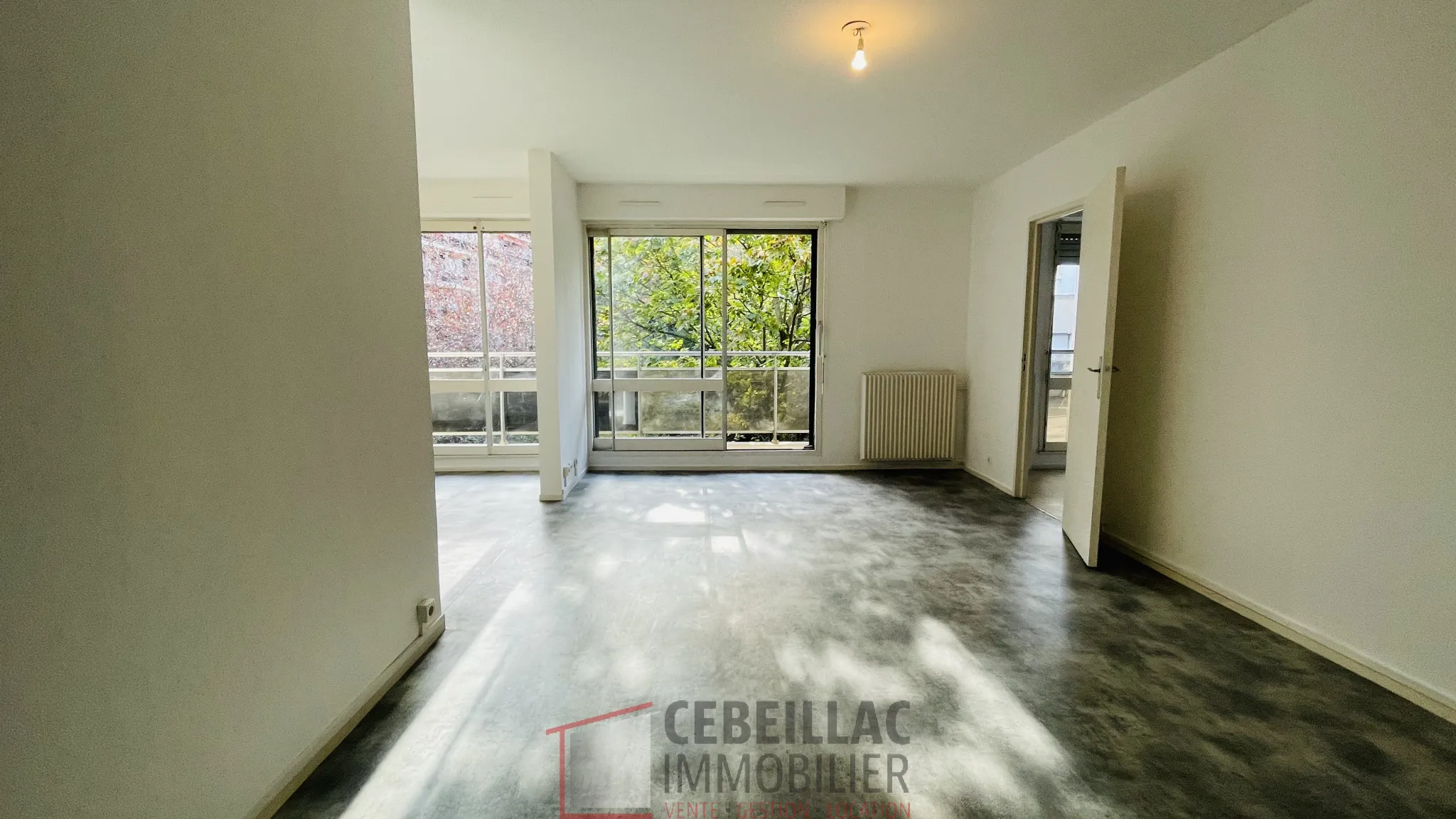 Appartement traversant de 78 m² à Clermont-Ferrand avec balcon et garage 