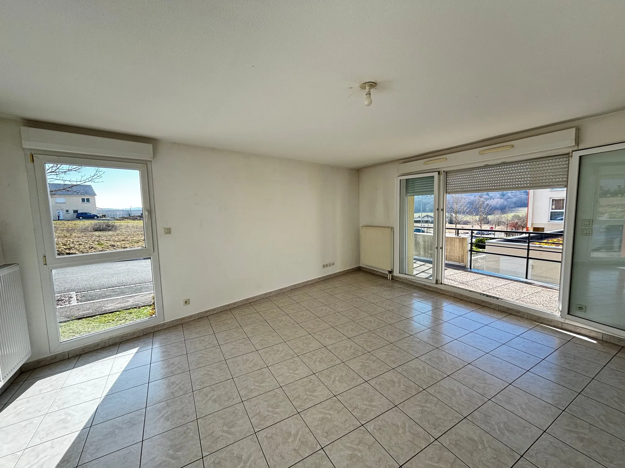 Bel appartement T3 avec terrasse et garage à Montbeliard 