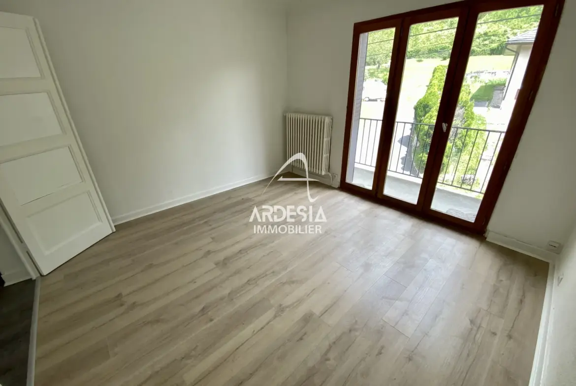 À vendre : Appartement T3 avec jardin et garage à Saint-Julien-Mont-Denis 