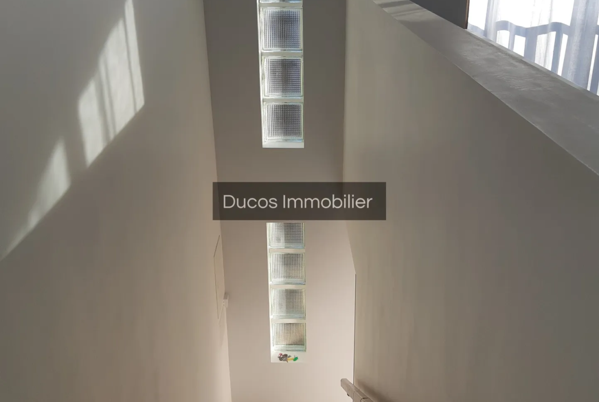 Immeuble à Duras avec 2 appartements T2 loués 