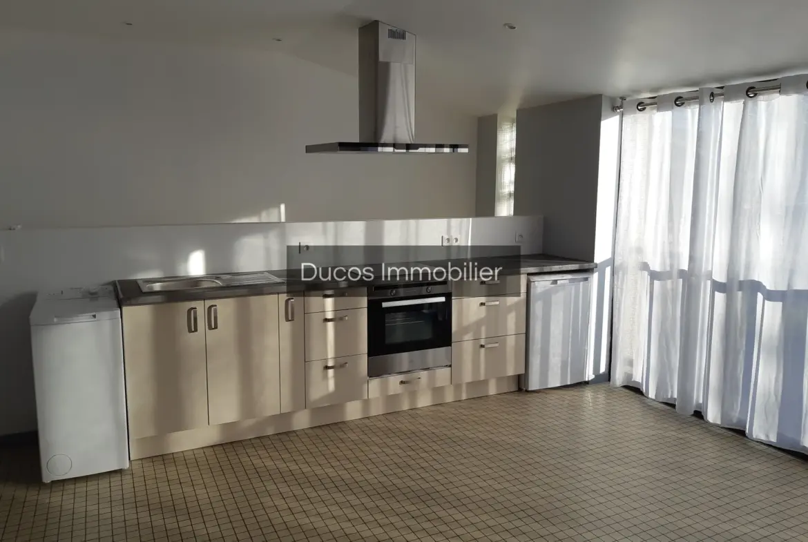 Immeuble à Duras avec 2 appartements T2 loués 