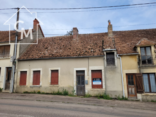 Maison de ville 3 pièces à rénover avec jardinet à Pougny