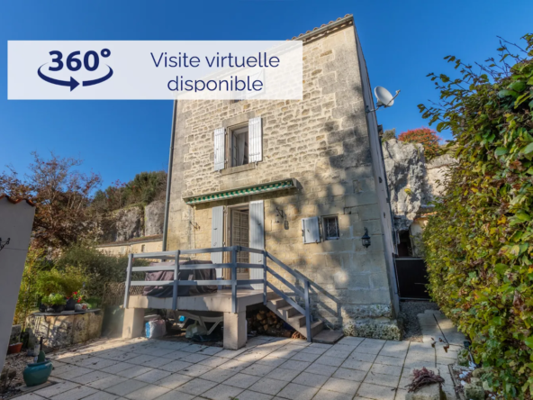 Maison ancienne charmante à Saint-Savinien avec cour et grotte