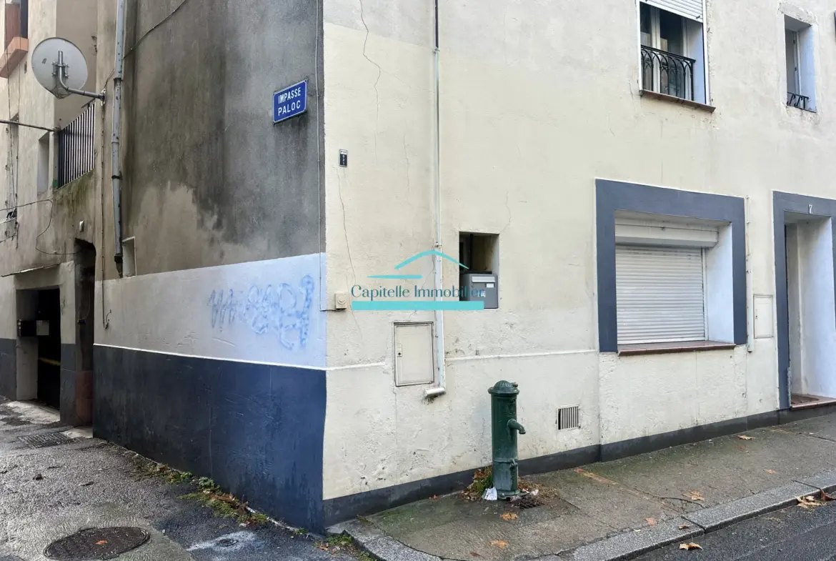 Vente d'un appartement T4 à Lodève avec cour et cave 