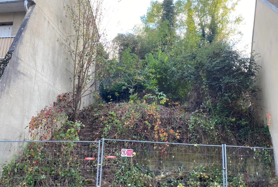 À Osny, terrain constructible de 450 m² à vendre 