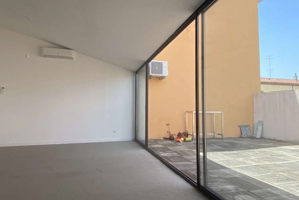 Appartement atypique avec terrasse au dernier étage à Perpignan 