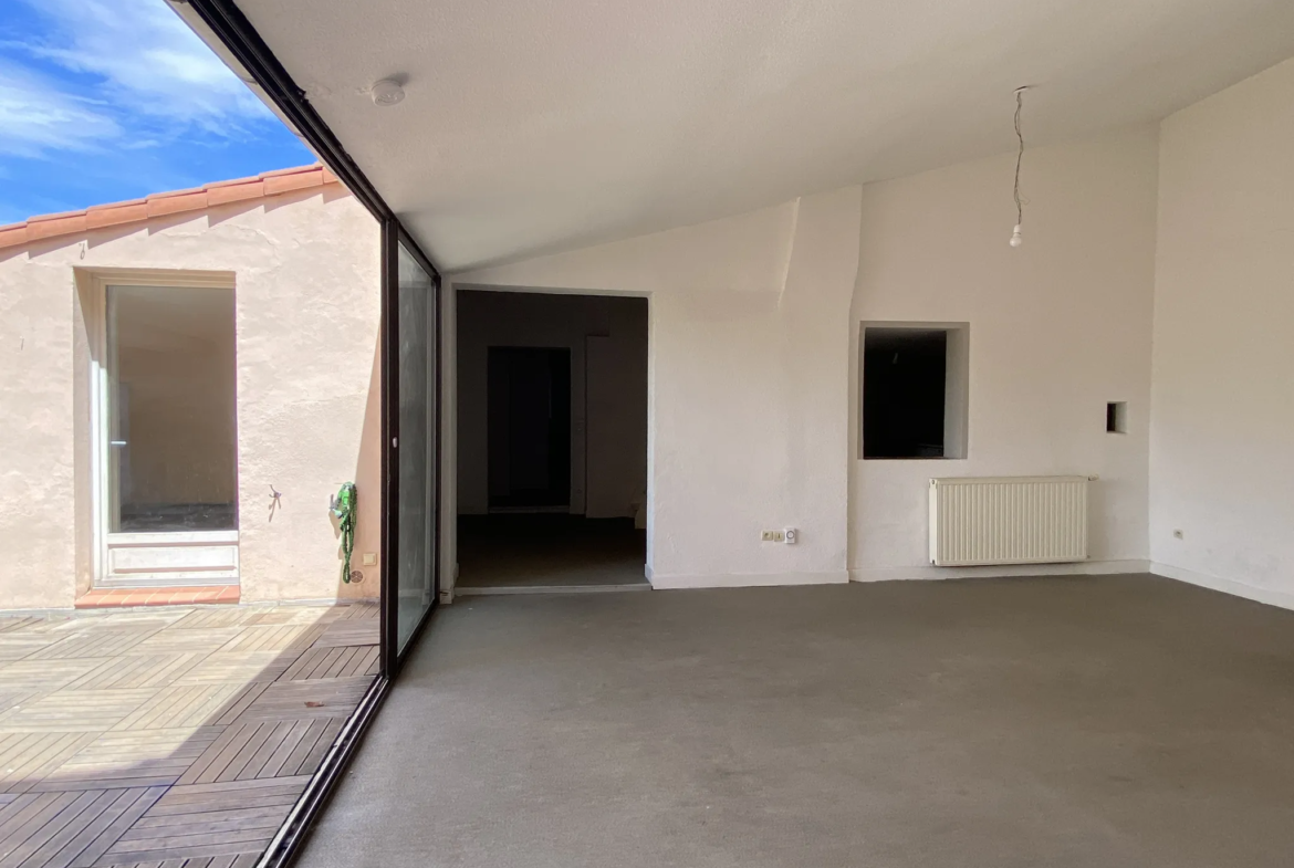 Appartement atypique avec terrasse au dernier étage à Perpignan 