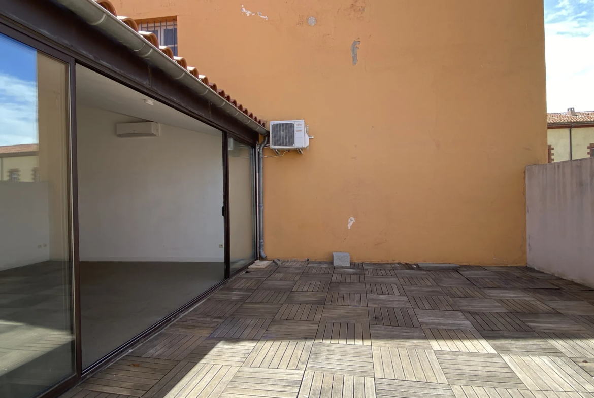 Appartement atypique avec terrasse au dernier étage à Perpignan 